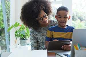 Mother & son using tablet